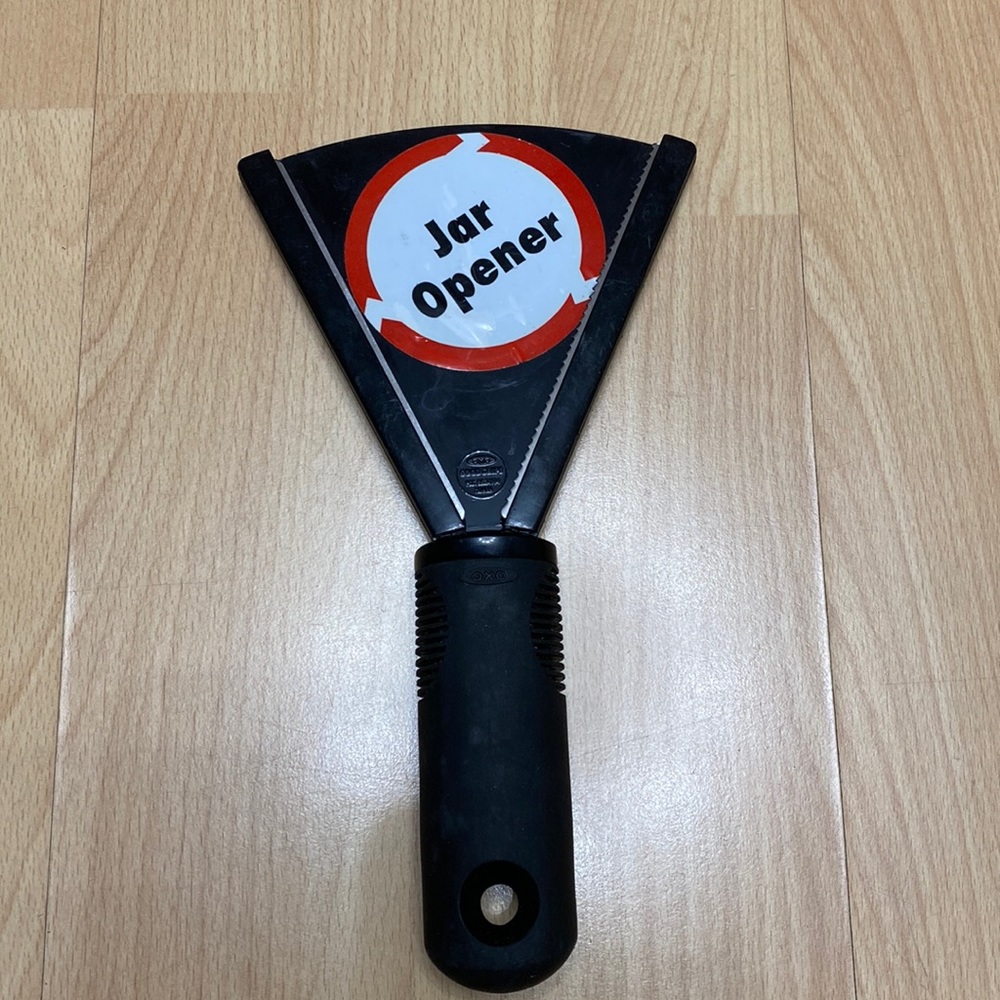 OXO JAR OPENER . Good GRIPS . NEW . STILL with sticker , been in the draw